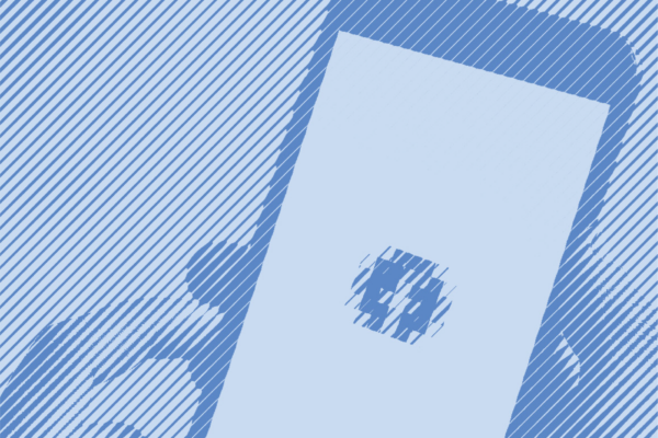 An image of a hand holding a phone with a social media icon.