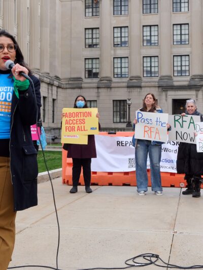 ACLU-NJ Campaign Strategist Alejandra Sorto addresses the crowd at an RFA Rally (Photo by Christopher Lopez for ACLU-NJ)