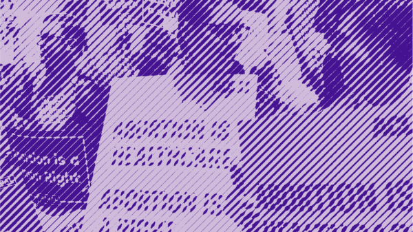 Two women in a crowd holding signs about abortion rights and abortion is healthcare.