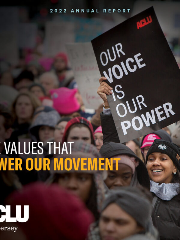 the front cover of the annual report that reads "the values that power our movement" with a protest image in the background.