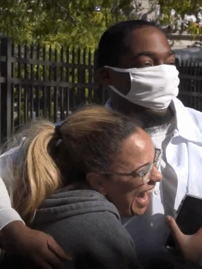 Two people hugging
