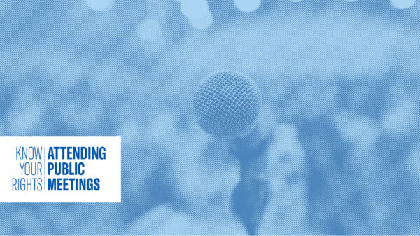 Mircophone in front a blurred crowd