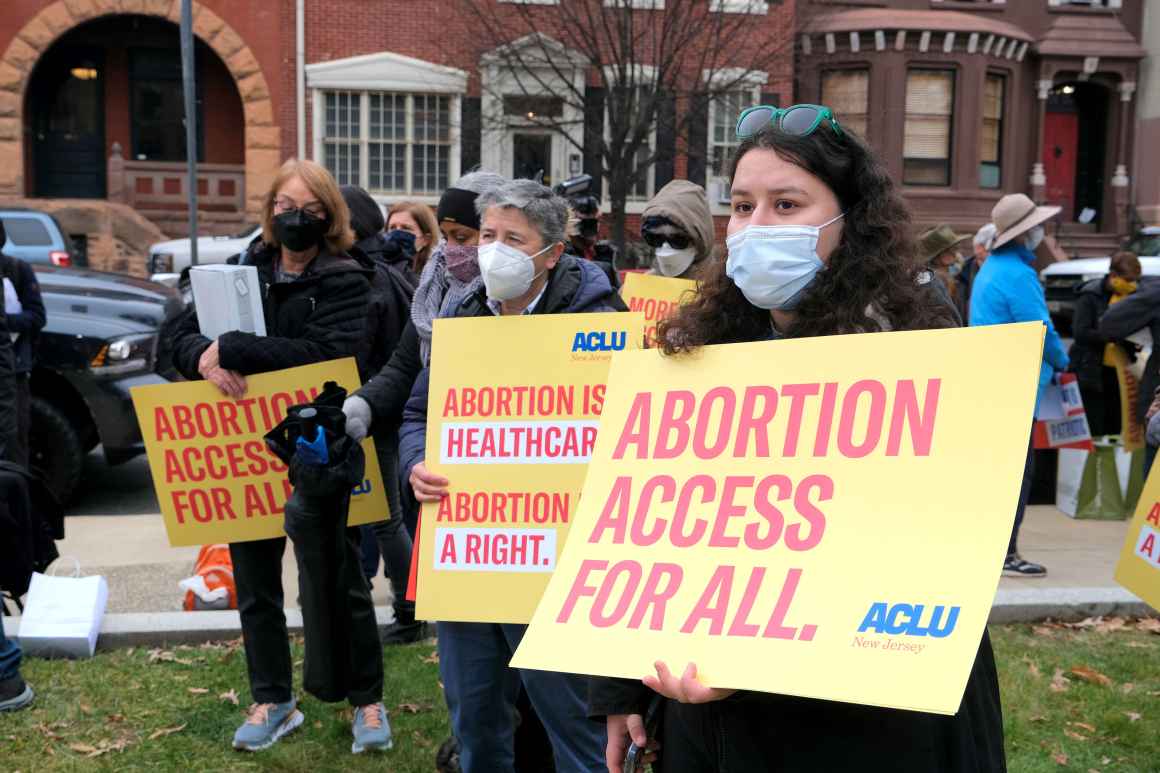 Protesters rally in front of the State House in Trenton in support of the Reproductive Freedom Act. (Photo by Christopher Lopez for ACLU-NJ)