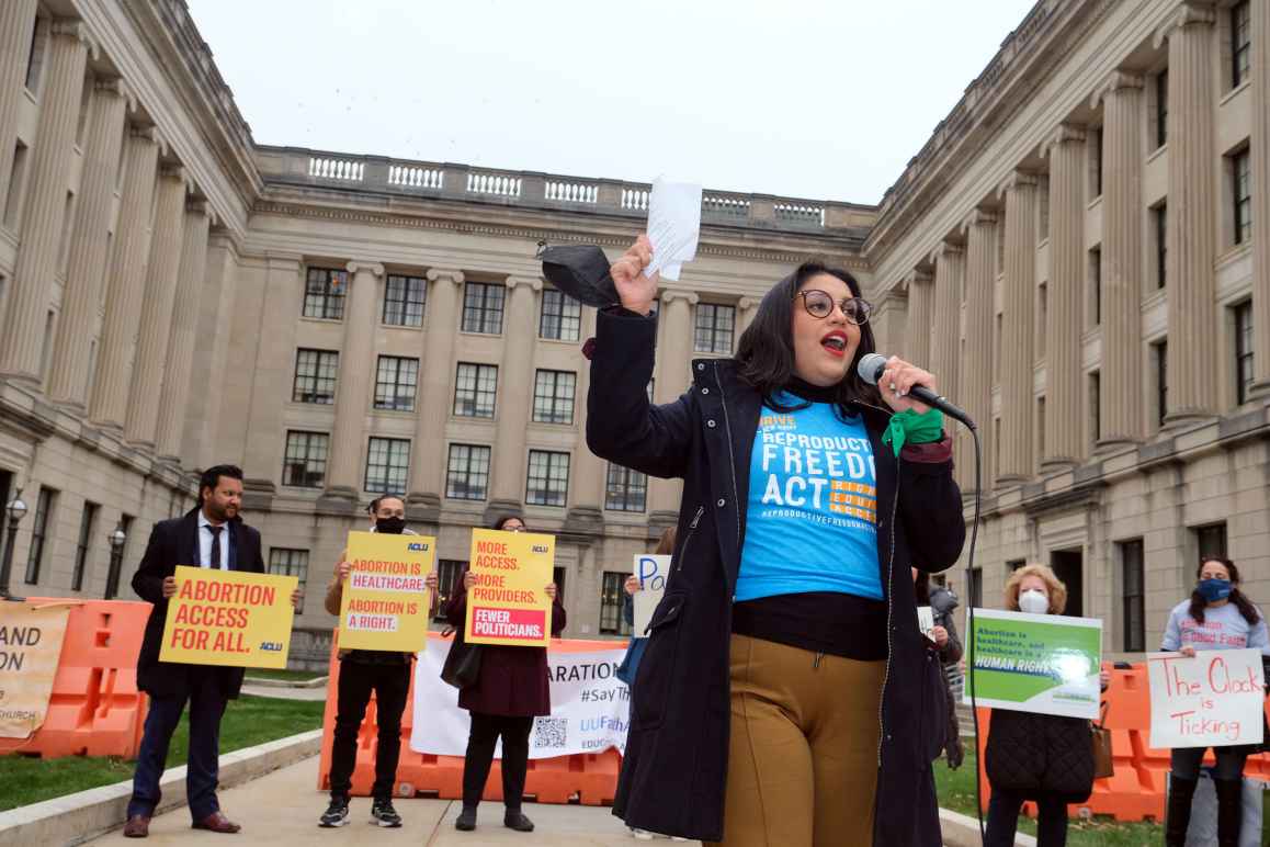 ACLU-NJ Campaign Strategist Alejandra Sorto speaks to the crowd at a rally outside the statehouse in Trenton, NJ.