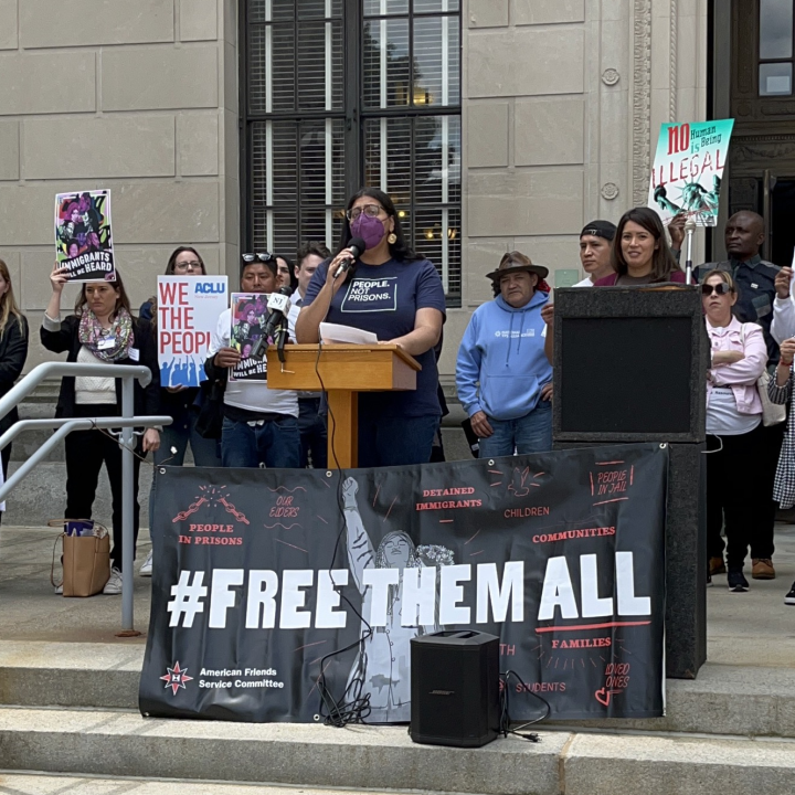 Protestors with a sign "#Freethemall" outside the NJ statehouse 