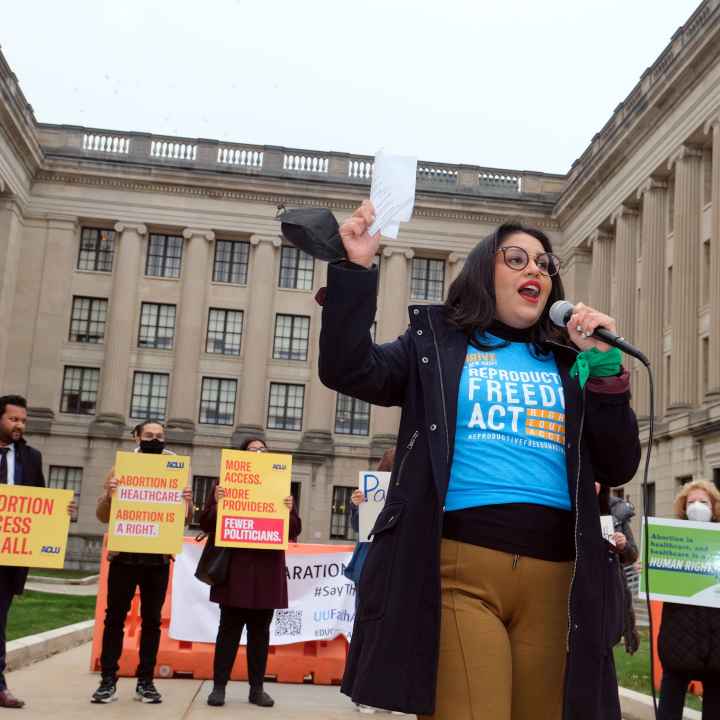 ACLU-NJ Campaign Strategist Alejandra Sorto speaks to the crowd at a rally outside the statehouse in Trenton, NJ.