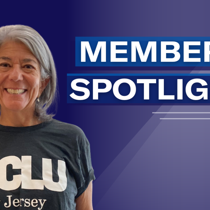 Women with grey hair in a grey Tshirt smiling against a dark blue background; includes the words "member spotlight"